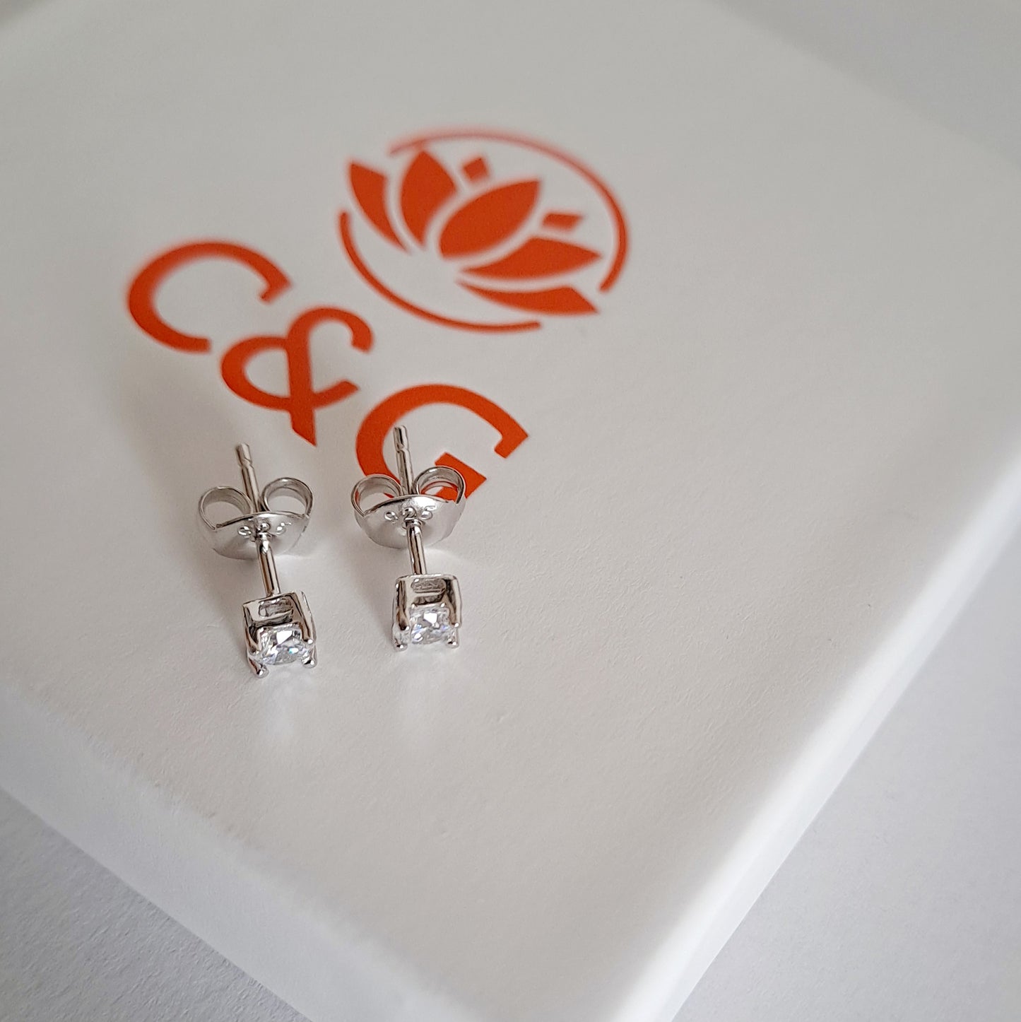 Orecchini punto luce in argento Sterling 925 Unisex
