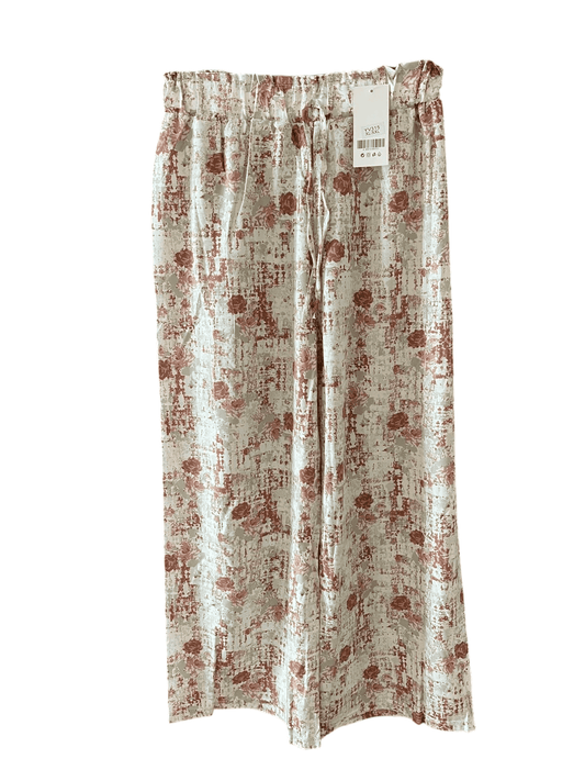 Pantaloni larghi beige
stampati