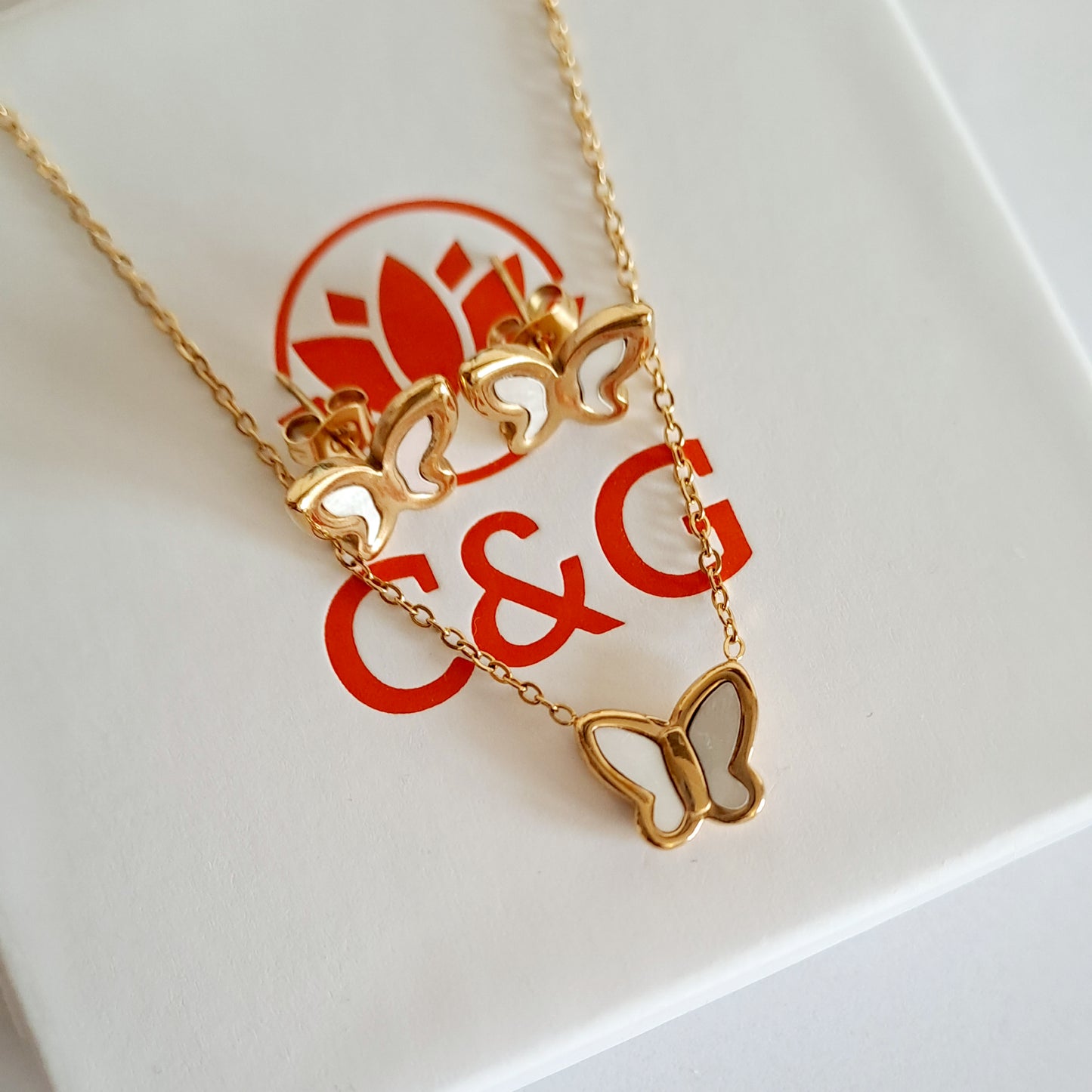 Set collana orecchini a farfalla