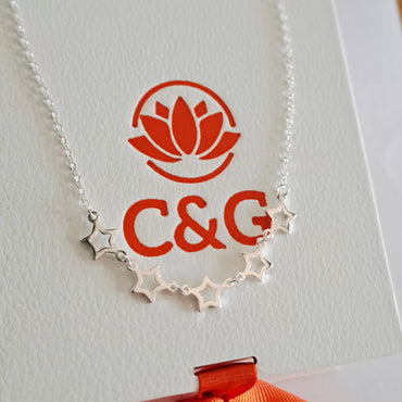 Parure collana bracciale con stelle